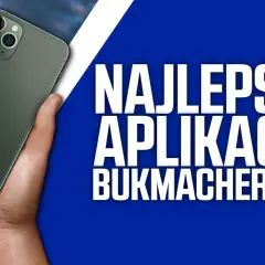 Dłoń trzyma smartfon z napisem "Najlepsze aplikacje bukmacherskie".
