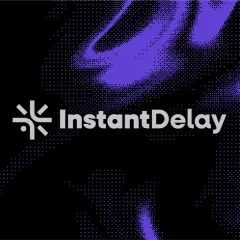 The "InstantDelay" logo appears on a black background with purple pixelated abstract shapes. This visual suggests a focus on minimizing streaming latency.
