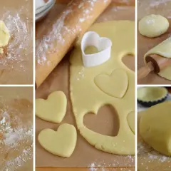 Preparazione di biscotti di pasta frolla a forma di cuore. L'impasto viene steso e tagliato con un coppapasta.