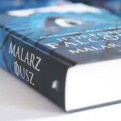 Okładka książki "Malarz dusz" Ildefonso Falconesa w odcieniach niebieskiego.