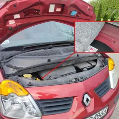Czerwony Renault z otwartą maską. W powiększeniu widać numer VIN wybity na karoserii pod wygłuszeniem.