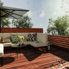 Aménagement toit terrasse avec canapé, parasol et vue sur la verdure. Un projet qui demande une autorisation.
