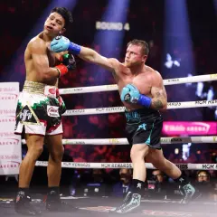 Canelo lands a powerful punch, showcasing his boxing prowess and adding to his list of accomplishments in the ring.
