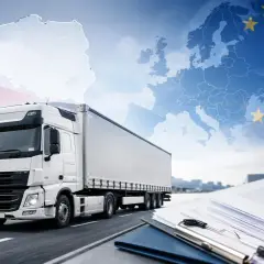 Ciężarówka na tle mapy Polski i Europy, symbolizująca transport międzynarodowy i licencję transportową.