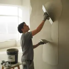 Tynkowanie krok po kroku: Poradnik DIY na gładkie ściany!