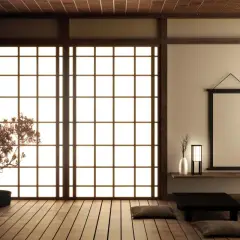 Minimalist Japanese room with shoji screen, bonsai tree, and low table.
