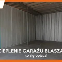 Wnętrze pustego garażu blaszanego z betonową posadzką i metalowymi ścianami.