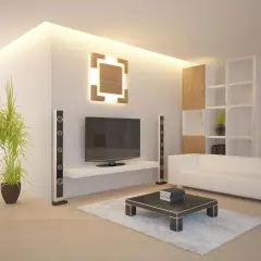 Modernes Wohnzimmer mit indirekter Beleuchtung an der Wand, die eine warme Atmosphäre schafft. Ein Fernseher, weiße Couch und ein Couchtisch sind zu sehen.