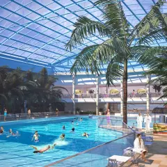 Tropikalny raj z basenami i palmami pod szklanym dachem. Sprawdź Suntago cennik i zaplanuj relaks!