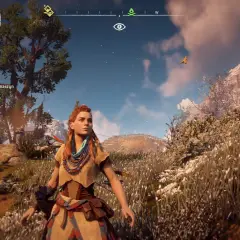 Aloy w Horizon Zero Dawn PC przemierza malowniczy świat, zbierając zasoby i walcząc z maszynami.