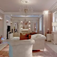 Elegancki salon w stylu francuskim, z kryształowymi żyrandolami, kominkiem i wygodnymi sofami.