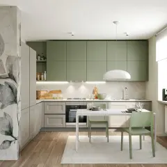 Cucina moderna con pensili color verde salvia, un murale floreale e un tavolo con sedie verdi.