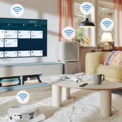 Salon z robotem sprzątającym i inteligentnymi urządzeniami sterowanymi przez smart hub.