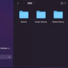 Auf dem Mac wird die externe Festplatte "SSD" mit den Ordnern "Games", "Origin Games" und "SteamLibrary" angezeigt.