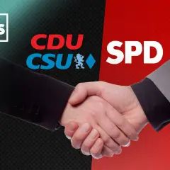 Händedruck zwischen CDU/CSU und SPD, die Parteien, welche Deutschland regieren.