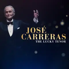 José Carreras w smokingu z uniesionymi rękami, na ciemnym tle z tekstem.