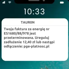 Ostrzeżenie przed smishingiem: fałszywa wiadomość od TAURON informuje o zaległej fakturze i grozi odłączeniem prądu, kierując na podejrzaną stronę.