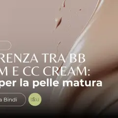 Guida per la pelle matura: scopri la differenza tra BB cream e CC cream. Texture cremosa e gocce di prodotto su sfondo nude.