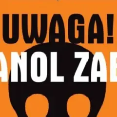 Uwaga! Metanol w winie zabija! Czarna czaszka na pomarańczowym tle ostrzega przed śmiertelnym zagrożeniem.