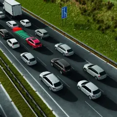 Na autostradzie samochody jadą w kolumnie, stosując zasadę ograniczonego zaufania. Czerwony samochód ostrzega o zbliżaniu się do innych pojazdów.