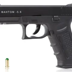 Czarny pistolet hukowy 6mm z Czech, model "ФАНТОМ -5.6", obok naboju.