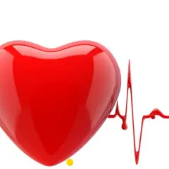 Czerwone serce na tle wykresu EKG, symbolizujące nieregularne bicie serca.
