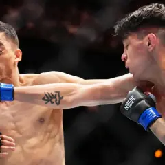 Ignacio Bahamondes träffas av ett slag i ansiktet under en intensiv MMA-match.