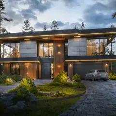 Nowoczesny dom wolnostojący w otoczeniu lasu, z oświetleniem podkreślającym architekturę i zadbany ogród.