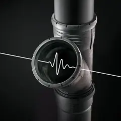 Un tubo di scarico con un'onda sonora bianca all'interno, che illustra perché lo scarico del bagno fa rumore.