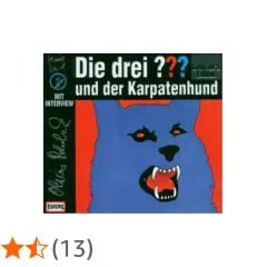 Cover von "Die drei ??? und der Karpatenhund" mit einem bedrohlichen blauen Wolf und dem Titel.