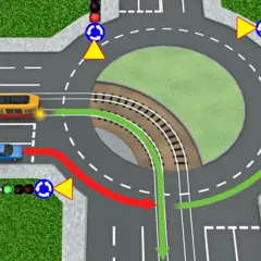 Tramwaj wjeżdżający na rondo ma pierwszeństwo. Na skrzyżowaniu widać tramwaj, samochód i znaki drogowe.