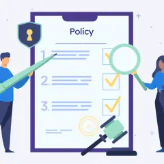 Two people review a policy document with a magnifying glass and pen, symbolizing effective policy management and compliance.