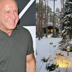 Krzysztof Miruć z żoną i dziećmi w zimowej scenerii przed domem.