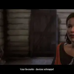 Młoda kobieta w karczmie, scena z gry Kingdom Come Deliverance. Poradnik.