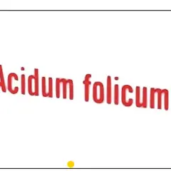 Napis "Acidum folicum" w kolorze czerwonym, lekko pochylony.