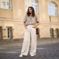 Spodnie z wysokim stanem: Jakie bluzki modelują sylwetkę?