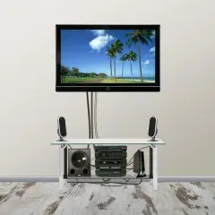 Eleganckie rozwiązanie, jak ukryć kable na ścianie za telewizorem i sprzętem audio, tworząc schludny wygląd.