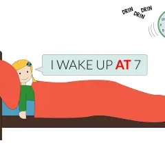 Bambina nel letto, sveglia suona. Impara le preposizioni di tempo: "Mi sveglio alle 7".