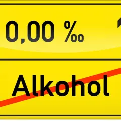 Znak drogowy informuje, że **ile trzyma alkohol w wydychanym powietrzu** to 0,00 promila.