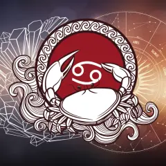 Rak, czerwiec znak zodiaku, otoczony kryształami i kołem zodiaku.