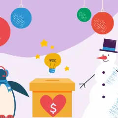 A penguin and snowman stand by a donation box, surrounded by holiday ornaments. This image sparks holiday charity ideas, with a lightbulb symbolizing inspiration.