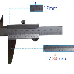 Apprenez comment lire un pied à coulisse avec cet exemple. La mesure principale est de 17mm, et la mesure vernier ajoute 0.34mm pour un total de 17.34mm.
