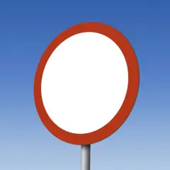 Puste białe koło z czerwoną obwódką na niebieskim tle. Znak drogowy informuje o zakazie ruchu w obu kierunkach.