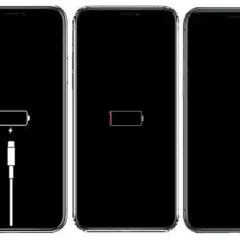 Trzy iPhone'y z czarnymi ekranami. Pierwszy pokazuje ikonę baterii z kablem, drugi pustą baterię, trzeci czarny ekran. Wskazuje na potrzebę wymiany baterii iPhone 13 Pro.
