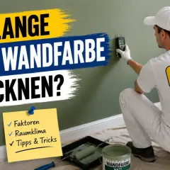 Ein Maler prüft mit einem Messgerät, wie lange Wandfarbe zum Trocknen braucht. Faktoren wie Raumklima und Tipps werden erklärt.