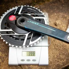 SRAM Red crankset weights 399g on a digital scale. This lightweight component is ready for performance cycling.