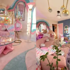 A vibrant living room embracing pastel maximalism with pink tufted sofas, a panther coffee table, and a rainbow mural.