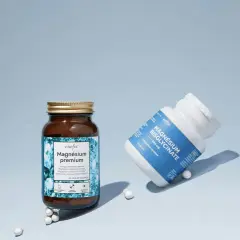 Deux flacons de compléments alimentaires : "Magnésium premium" et "Magnésium Bisglycinate". Lequel choisir pour un apport optimal ?