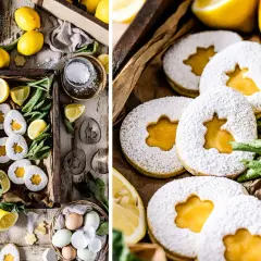 Zuckrige Kekse mit leuchtend gelbem Lemon Curd gefüllt, umgeben von frischen Zitronen und grünen Blättern.
