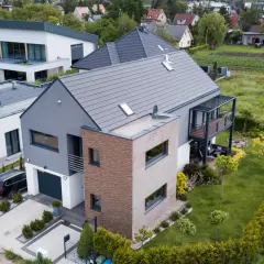 Nowoczesny dom z ogrodem. Zastanawiasz się, ile kosztuje budowa domu 200m?